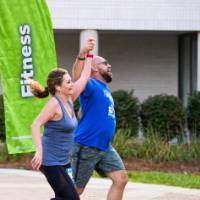 A couple finishing the event while holding hands